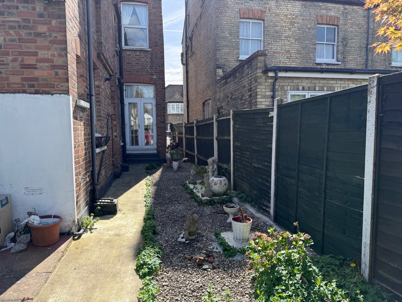 Tight gap between rear extensions of neighbouring properties, illustrating an overbearing, enclosed effect